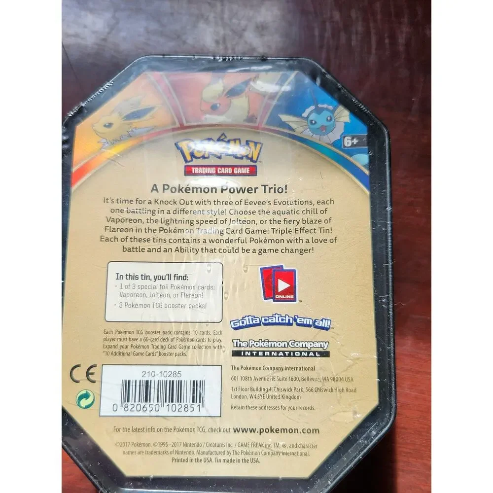 Pokemon TCG XY Triple Effect Tin Sealed Vaporeon Ancient Origins Roaring Skies